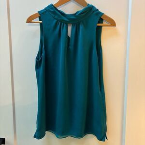 White House Black Market Teal Sleeveless silk top
Women's size S